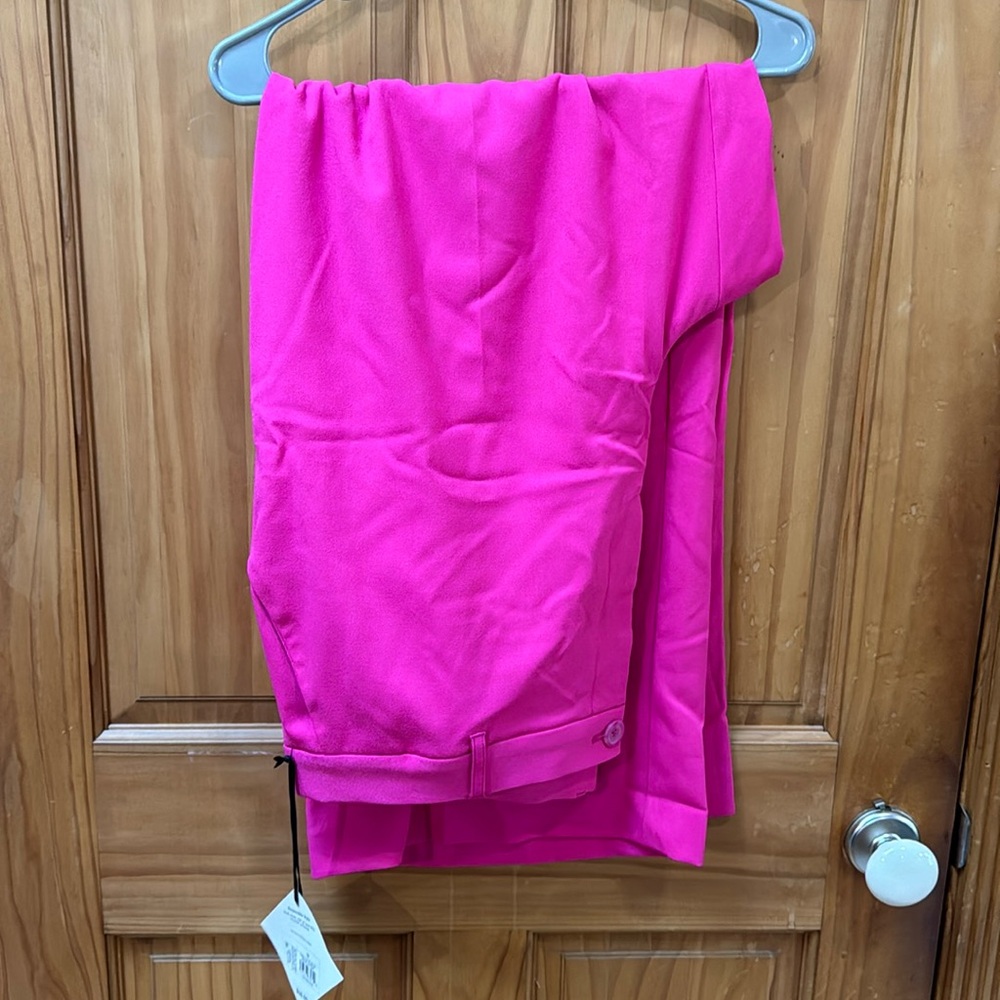 Pink wide leg work pants.